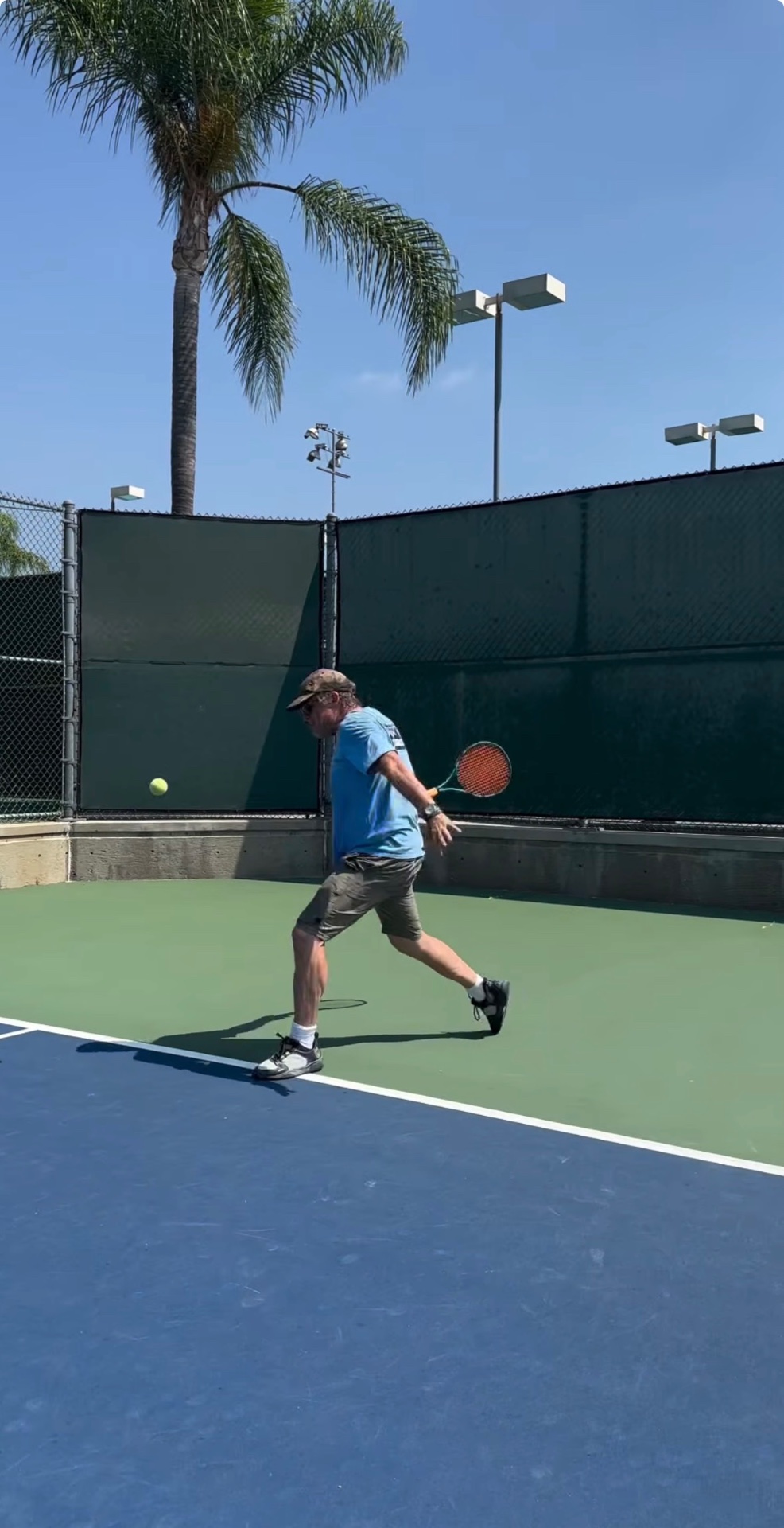 Player hitting a forehand