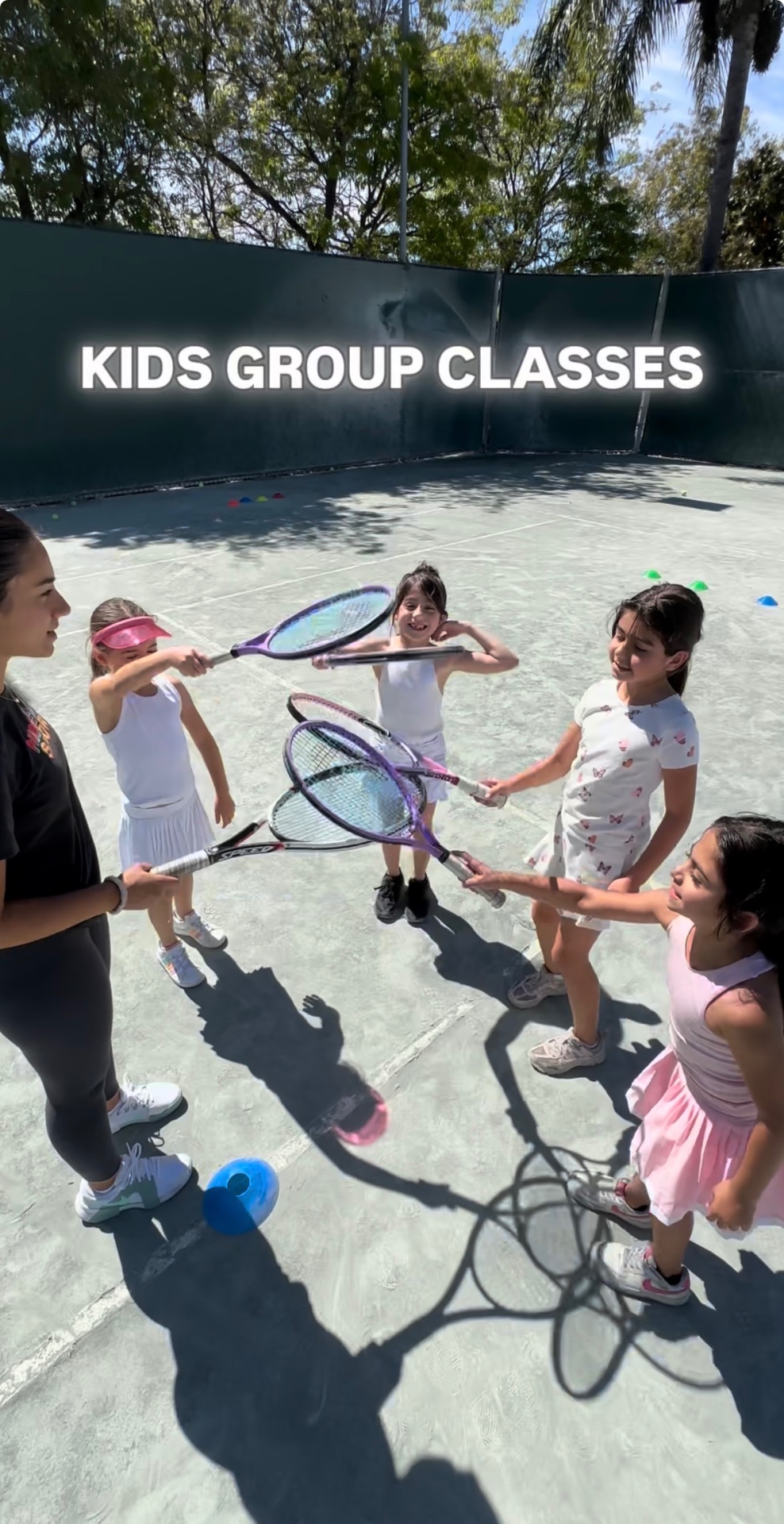 Kids group class — rackets together